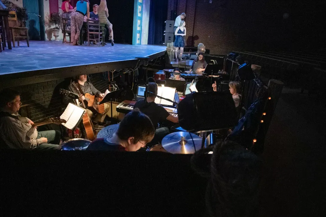 Mamma Mia rehearsal with orchestra pit